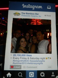 Clubgoers at Bamboo pose at the bar's Instagram cutout. (Credit: Bamboo)