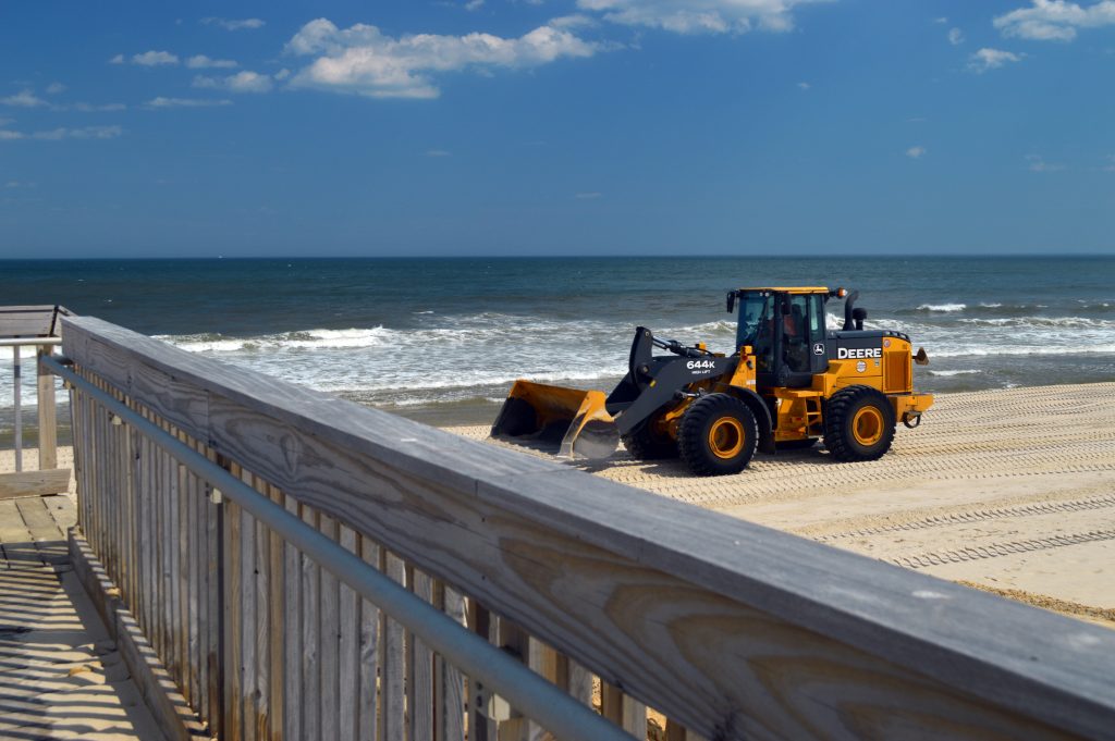A tractor moves sand on the Ortley Beach oceanfront, April 26, 2016. (Photo: Daniel Nee)