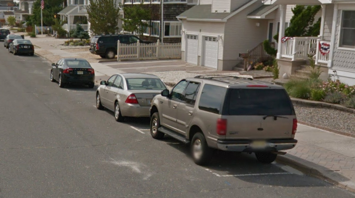 An ocean block in Lavallette, with lined parking spaces.