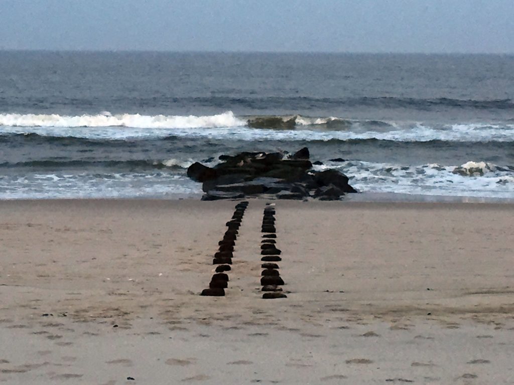 An exposed jetty illustrates the small amount of sand east of the dune line on Elizabeth Avenue in Lavallette. (Photo: Daniel Nee)