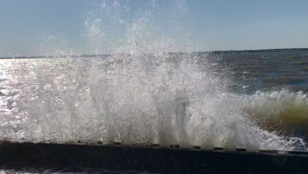 A wave crashes over a bulkhead in Seaside Park, N.J., Oct. 30, 2017. (Photo: Daniel Nee)