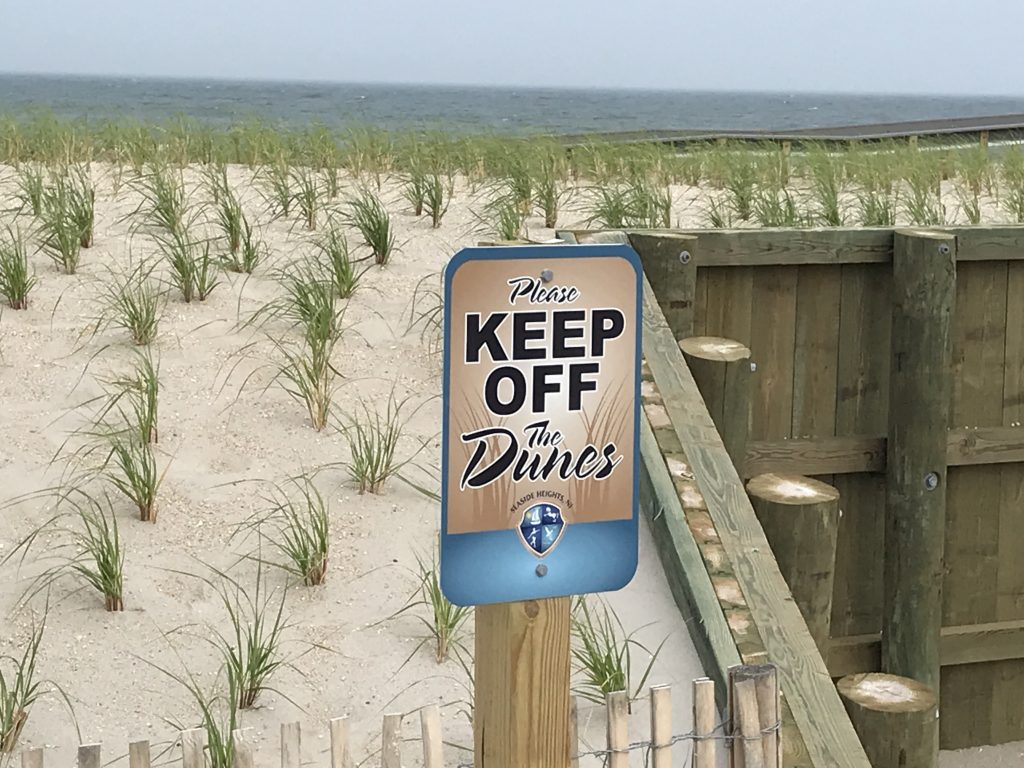 A 'Keep off the Dunes' sign in Seaside Heights, N.J., June 2019. (Photo: Daniel Nee)