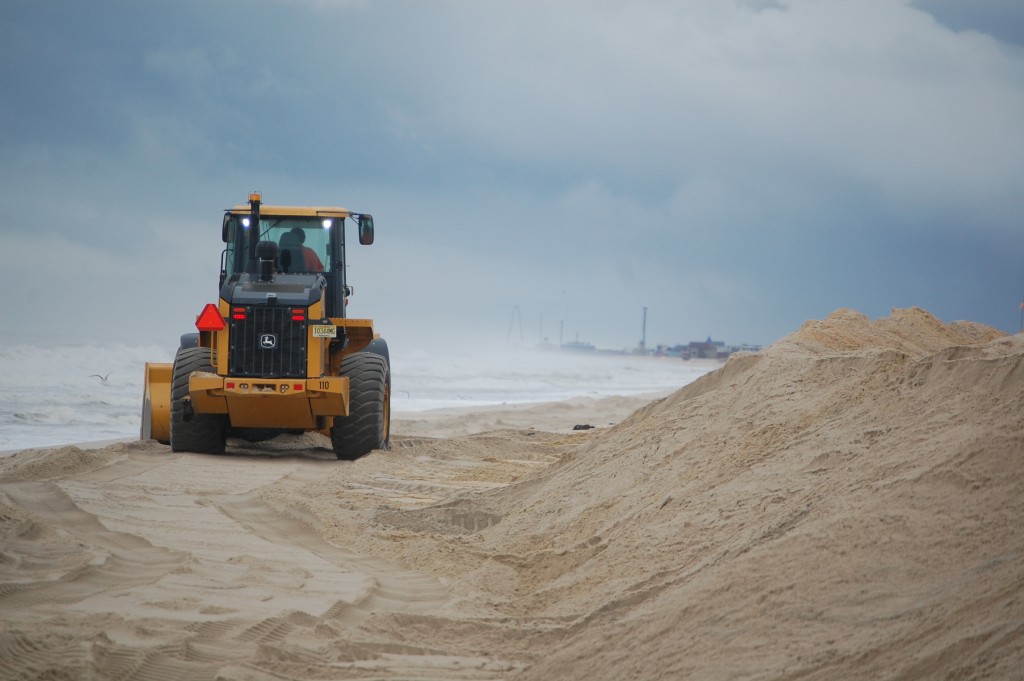 A front loader shores up dunes in Toms River's Normandy Beach section, Sept. 30, 2015. (Photo: Daniel Nee)
