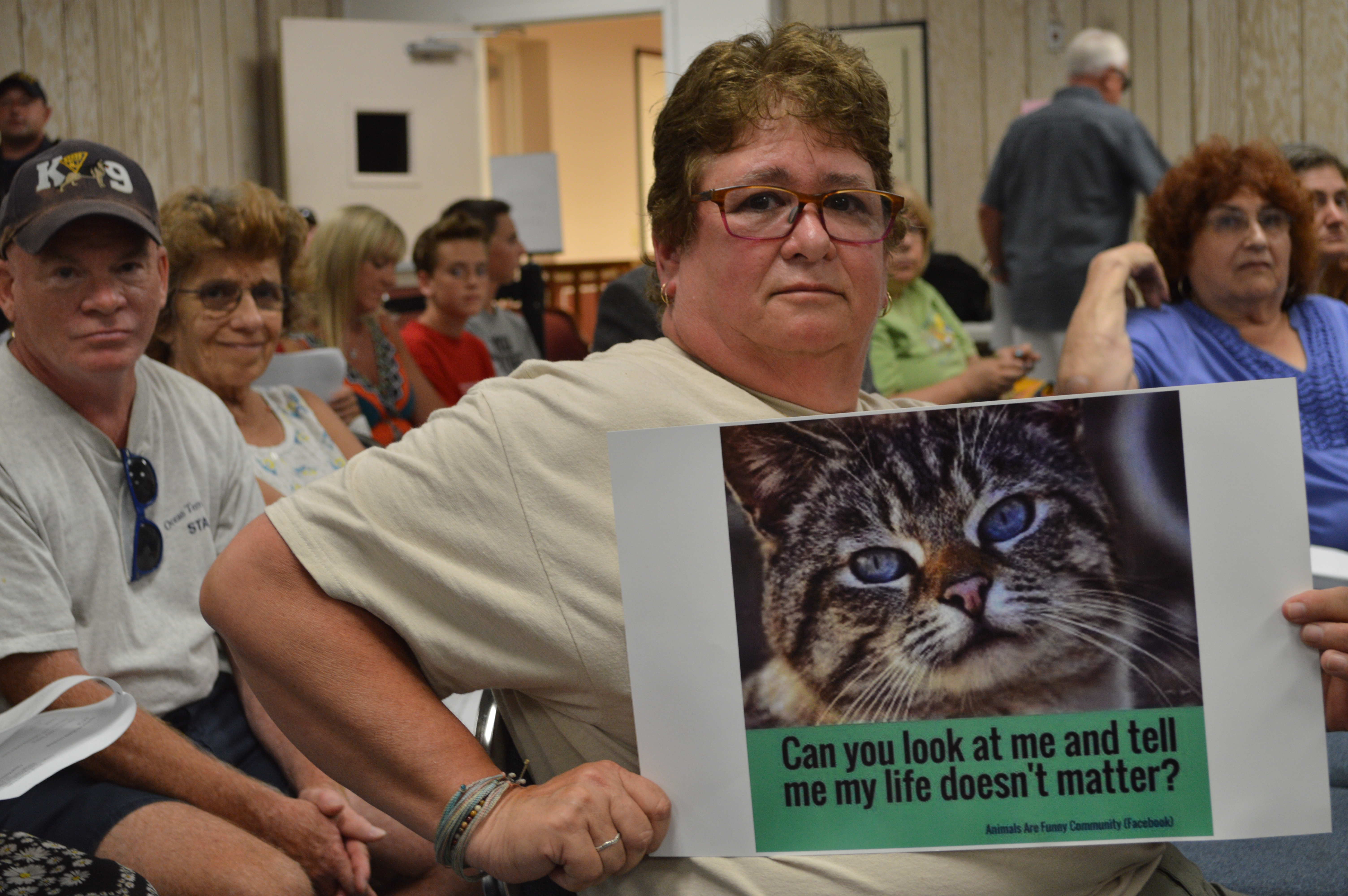 A protester at the Seaside Heights council meeting, July 20, 2016. (Photo: Daniel Nee)