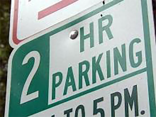 A two-hour parking limit sign. (File Photo)