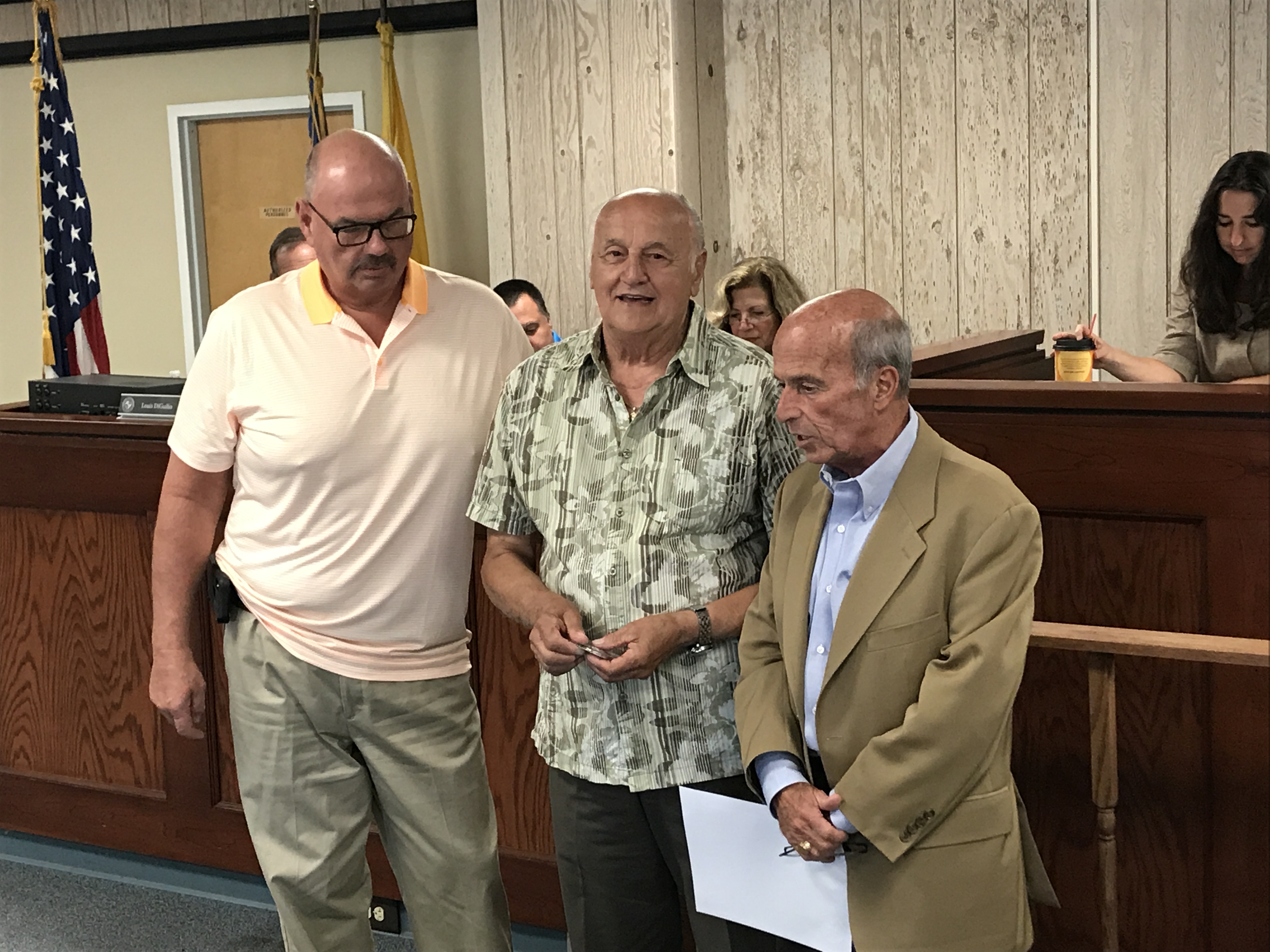 Councilmen Rich Tompkins and Guy Mazzanti receiving honors at the Seaside Heights municipal complex. (Photo: Daniel Nee)
