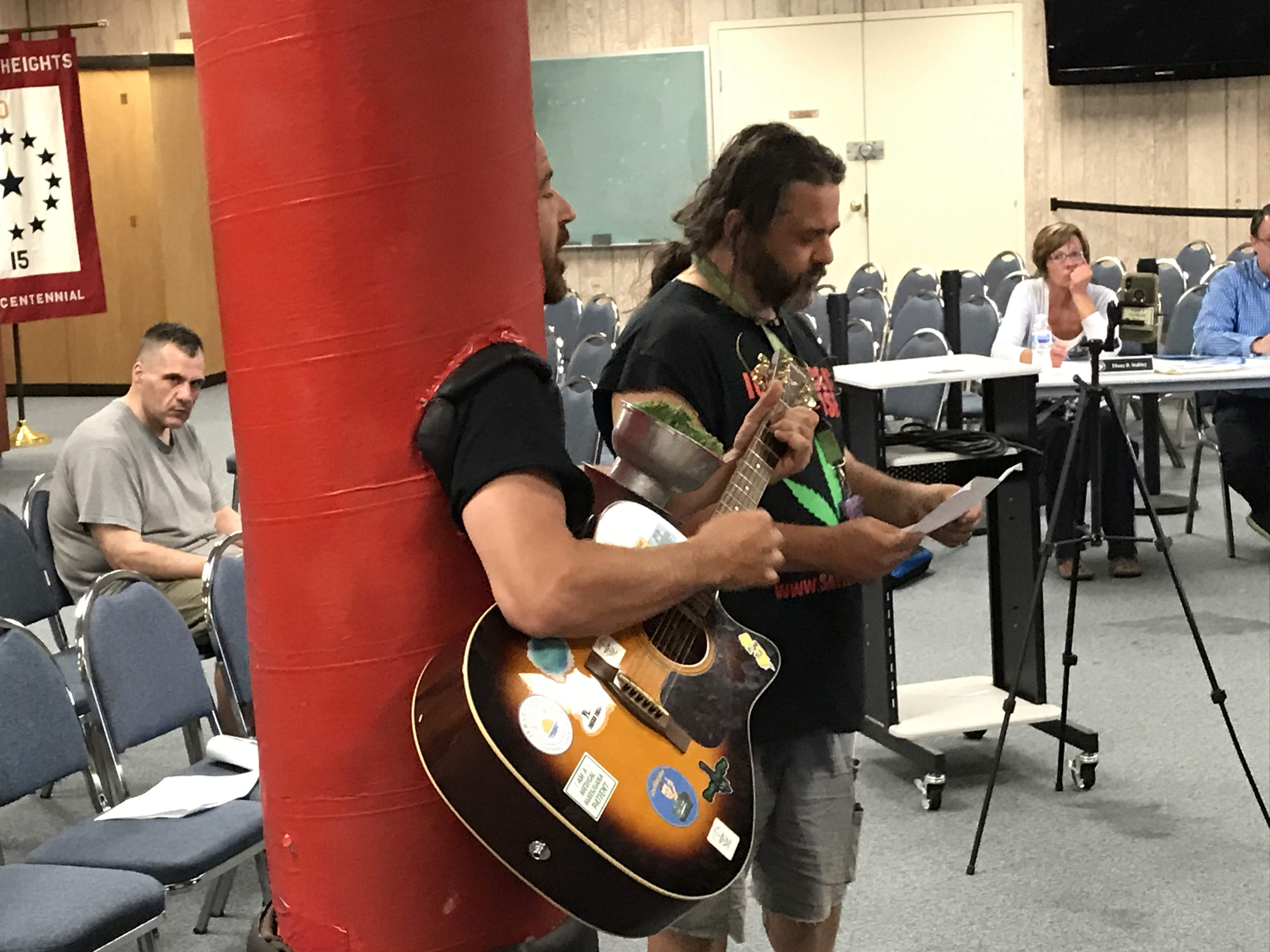 Edward 'Lefty' Grimes and a friend perform 'You Can't Get No Weed Here' in front of the Seaside Heights borough council, June 5, 2019. (Photo: Daniel Nee)