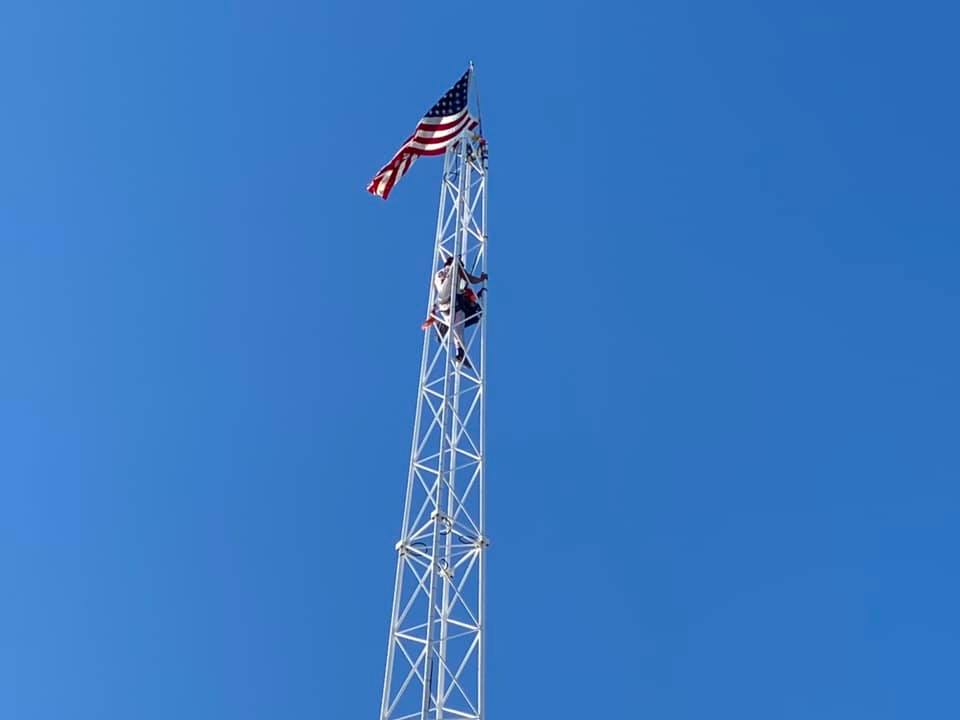A man climbs to the top of the Skyscraper ride in Seaside Heights, June 22, 2020. (Supplied Photo)