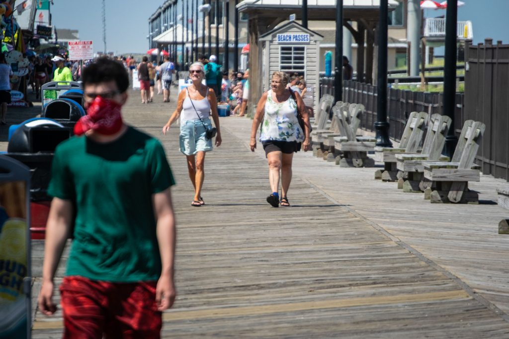 Visitors to the boardwalk and rides in Seaside Heights, N.J. wear face masks July 8, 2020. (Photo: Daniel Nee)