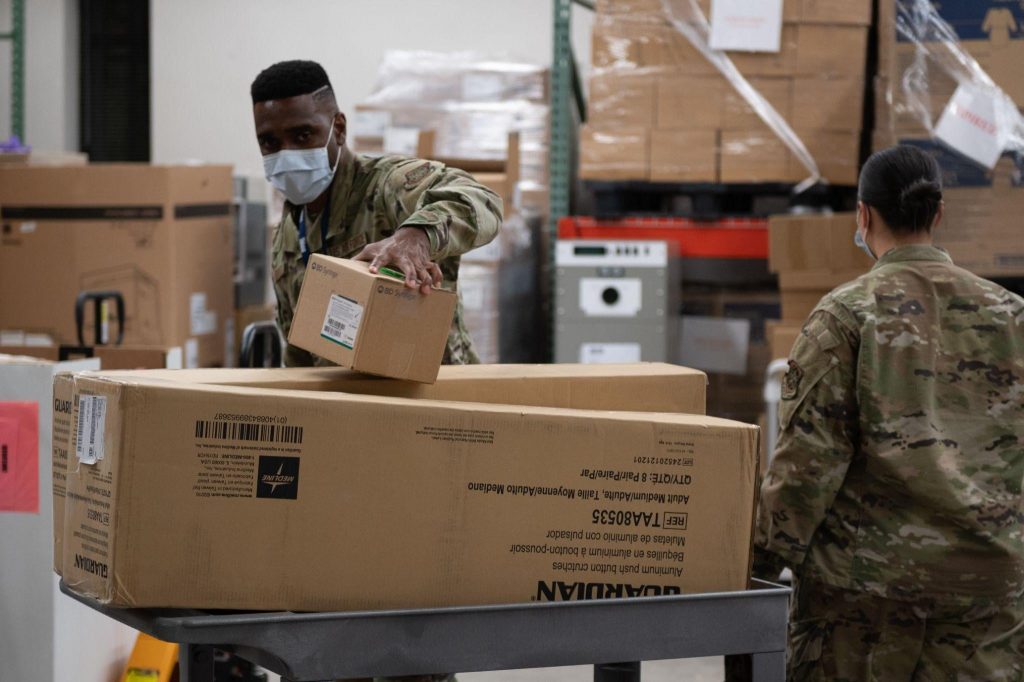Joint Base McGuire-Dix-Lakehurst personnel get ready for the arrival of Afghan refugees, Aug. 2021. (Photo: Joint Base MDL)