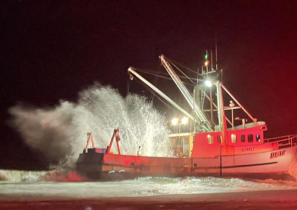 A commercial fishing vessel, Bear, grounded at Island Beach State Park, Oct. 10, 2021. (Credit: Seaside Park Fire Dept.)