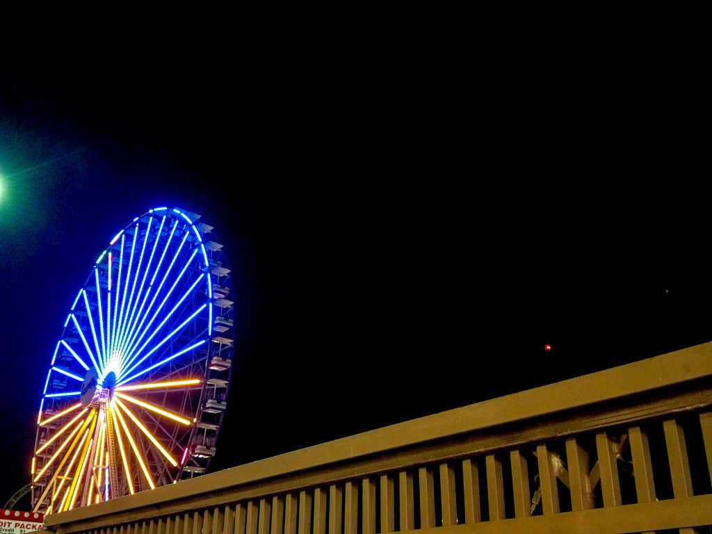 The Ferris wheel at Casino Pier, Seaside Heights, N.J., lit up in Ukrainian colors, March 7, 2022. (Photo: Daniel Nee)