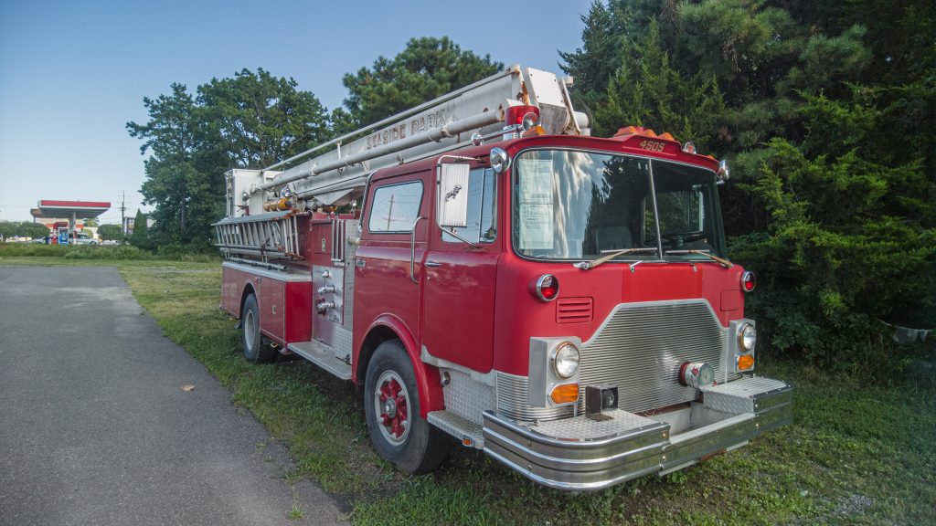 The former truck 4505 from the Seaside Park Fire Company sits parked in a Lakewood lot alongside Route 88. (Photo: Daniel Nee)