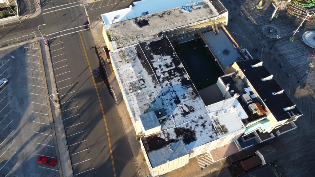An aerial view of the roof of the Aztec Ocean Resort motel, where 16 wireless antennas have been approved, Nov. 2022. (Photo: Daniel Nee)