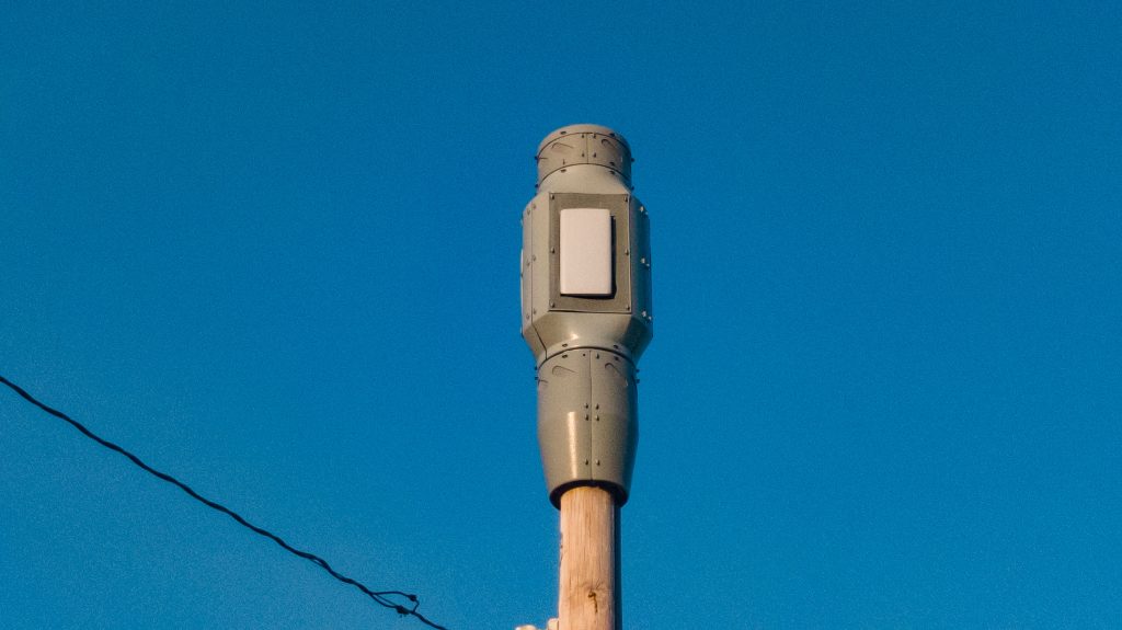 A small 5G wireless facility on top of an existing timber pole, Lavallette, N.J., May 2023. (Photo: Shorebeat)