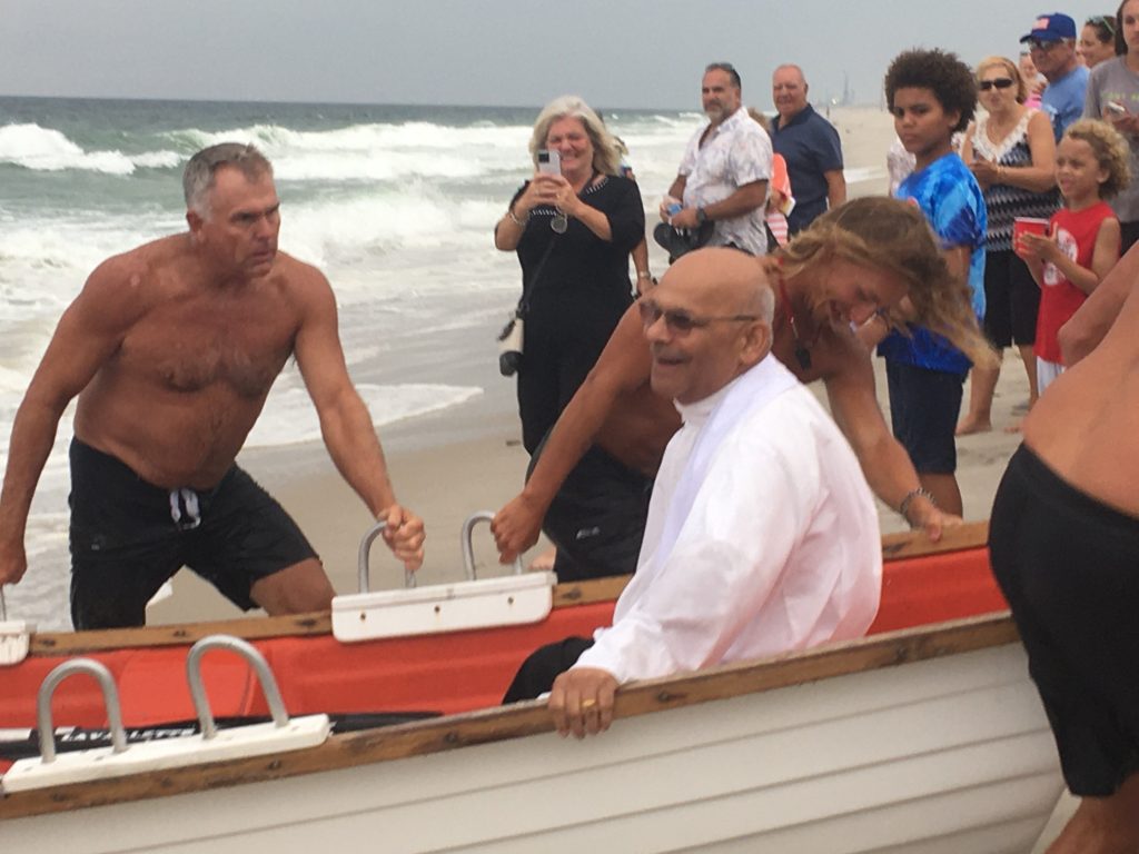 Lifeguards are honored during St. Pio's Blessing of the Water in Lavallette, Aug. 2023. (Photo: Anita Zalom)