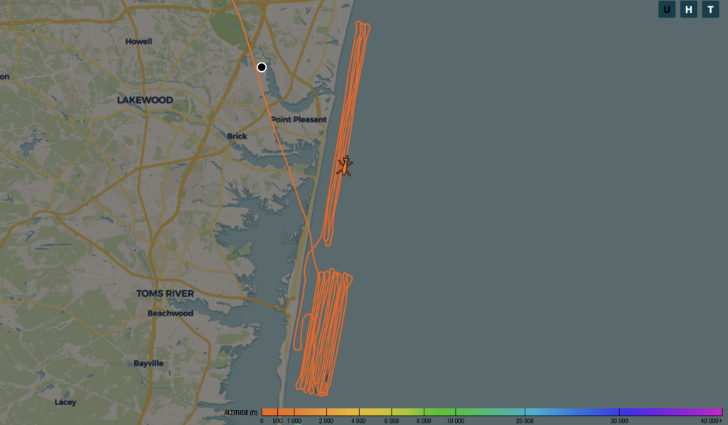 The grid search being conducted by a U.S, Coast Guard MH-65D Dolphin helicopter off Ocean County. (Credit: ADS-B Exchange)