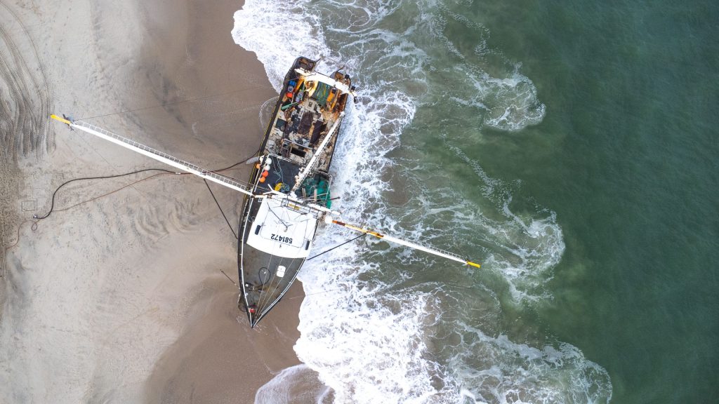 A 77-foot commercial fishing vessel runs aground in Point Pleasant Beach, N.J., Nov. 17, 2023. (Photo: Shorebeat)